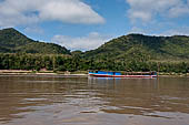 Laos. Along the stretch of the Mekong that leads north from Luang Prabang to the PakOu caves.